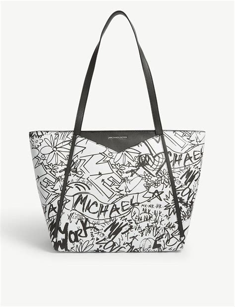 michael kors black and white graffiti design backpack|Michael Kors belt bags.